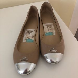 Coach flats. Great neutral color with silver accent.